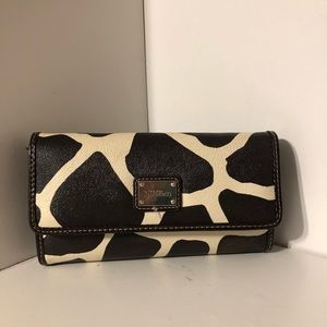 A cow print Nine West wallet.